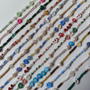 Colliers daisy et perles