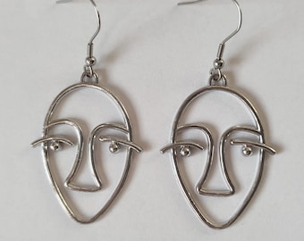 Abstract earrings | Serious face