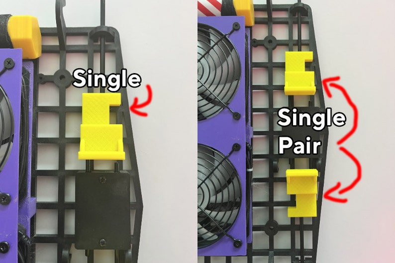 May include: Two black plastic fan mounts with yellow plastic clips labeled "Single" and "Single Pair".