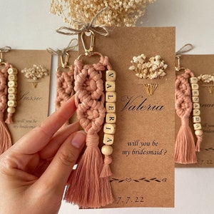 A personalized gift card for you. Key chain made of macrame thread. Used as wedding gift, birthday gift, welcome gift, Bachelorette Party. Will you be my Bridesmaid, Bachelorette Party Gifts for Bridesmaids ,The name and date are written on the card.