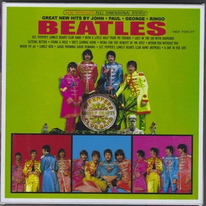 May include: The Beatles' "Sgt. Pepper's Lonely Hearts Club Band" album cover. The image shows the band members in military-style jackets against a green backdrop. The album title and song titles are displayed in bold text. A classic piece of music history.