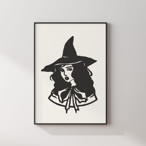 Puede incluir: Ilustración en blanco y negro de una bruja con un sombrero puntiagudo y cabello largo. La bruja lleva un gran lazo alrededor del cuello.