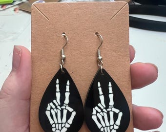 Pendientes con el símbolo de la paz