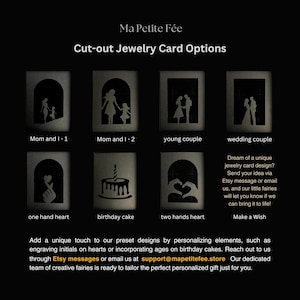 May include: A black display board titled Ma Petite F&eacute;e Cut-out Jewelry Card Options featuring eight silhouette designs: Mom and I, young couple, wedding couple, one hand heart, birthday cake, and two hands heart, with custom design contact text.