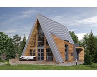 Peut inclure: Une cabane en A de conception moderne. L'extérieur présente une combinaison de bardage en bois et d'un toit en métal gris. De grandes fenêtres offrent une vue sur les arbres et le ciel environnants. Un petit patio avec des sièges est visible.