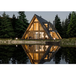 Op de afbeelding: Een modern A-frame huis met grote ramen en een donkergrijs dak, weerspiegeld in een stil meer in de schemering.