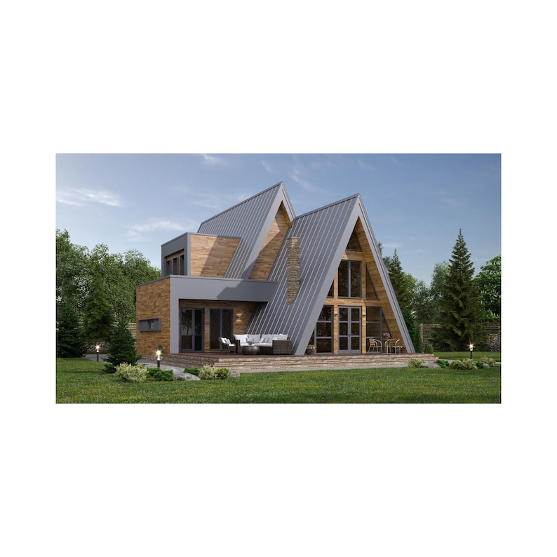 May include: A-frame style house with a modern design. The house features a gray metal roof, wooden siding, and large windows. A patio with white furniture is visible. The house is surrounded by green grass and trees under a blue sky.
