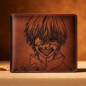 May include: A brown leather wallet featuring a detailed engraved illustration of an anime character. The artwork depicts a character with a mask and detailed facial features. The wallet is rectangular and appears to be closed.