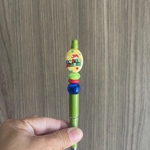 Super Mario mit Pilzstift