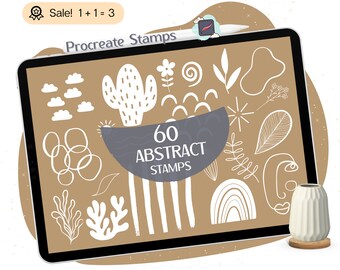 May include: A digital tablet displaying 60 abstract stamps for use in the Procreate app. The stamps are white and feature various shapes, lines, and patterns. The tablet is on a brown surface with a white vase.