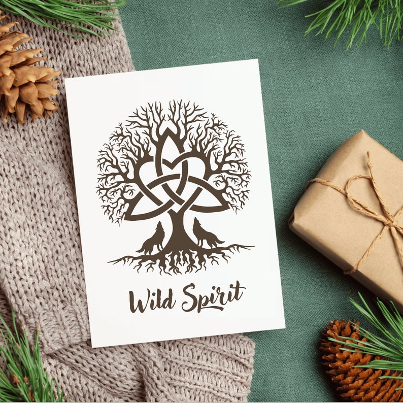 May include: A brown silhouette of a tree with a Celtic knot design in the shape of a heart. Two wolves are howling at the moon. The text "Wild Spirit" is below the tree.