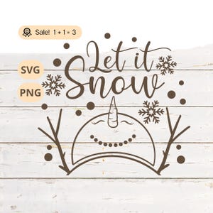 May include: A brown graphic with the words "Let it Snow" in a whimsical font, featuring a snowman face, snowflakes, and dots. The image includes "SVG" and "PNG" labels, and a "Sale! 1+1=3" badge.