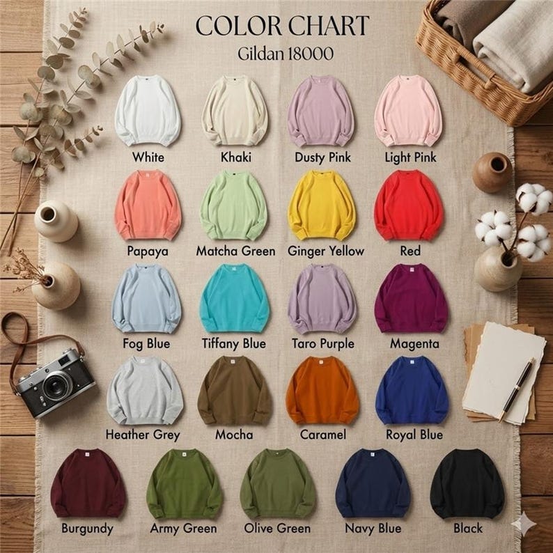 May include: A color chart of Gildan 18000 crewneck sweatshirts in various colors, including white, khaki, dusty pink, light pink, papaya, matcha green, ginger yellow, red, fog blue, tiffany blue, taro purple, magenta, heather grey, mocha, caramel, royal blue, burgundy, army green, olive green, navy blue, and black.