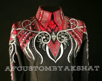 May include: A black and red show shirt with white and silver embroidery. The shirt features a geometric pattern and rhinestones. The text "AIFCUSTOMBYAKSHAT" is visible at the bottom of the image.