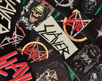 13 random SLAYER stickers + 2 holographic stickers!