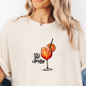 Lets Get Spritzy T-Shirt, Aperol Spritz Shirt, Italian Cocktail Tee, Summer Lounge Wear, Funny Gift for Best Friend, Bachelorette Party Tee