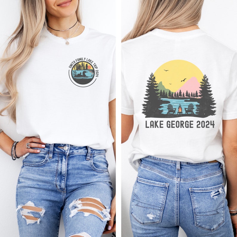 May include: White t-shirt with a circular design on the front that says "Smith Family Lake Trip 2024" and a loon silhouette. The back of the shirt has a silhouette of a lake scene with trees, a campfire, and the text "Lake George 2024".