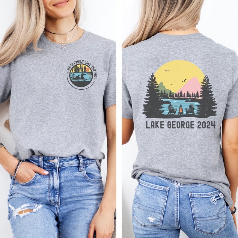 May include: Gray t-shirt with a graphic of a lake scene and the text "LAKE GEORGE 2024" on the back. The front of the shirt has a circular graphic with the text "SMITH FAMILY LAKE TRIP 2024".