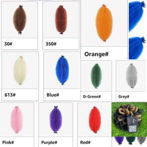 May include: A collection of colorful, textured hair extensions in various shades, including brown, orange, blue, green, grey, pink, purple, and red. Each extension is labeled with a color code.