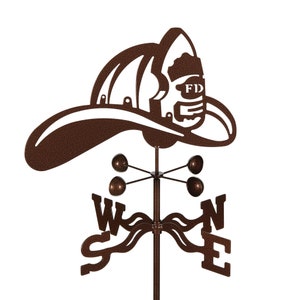 May include: A brown metal firefighter hat weather vane with a compass rose and four bells. The hat has the letters "FD" on the front.