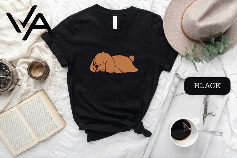 a black shirt with a brown dog on it