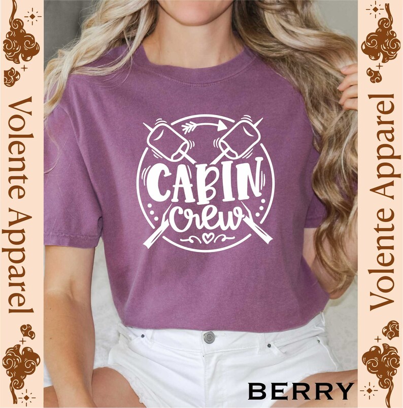 a woman with long hair wearing a purple shirt