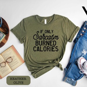 a t - shirt that says if only jackson burned calories