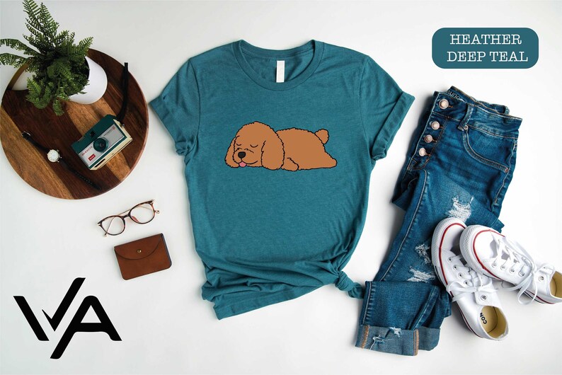 a shirt that has a dog on it