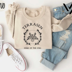 a pair of jeans and a t - shirt with the words terrasan on it