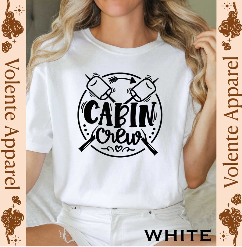 a woman wearing a t - shirt that says cabin crew
