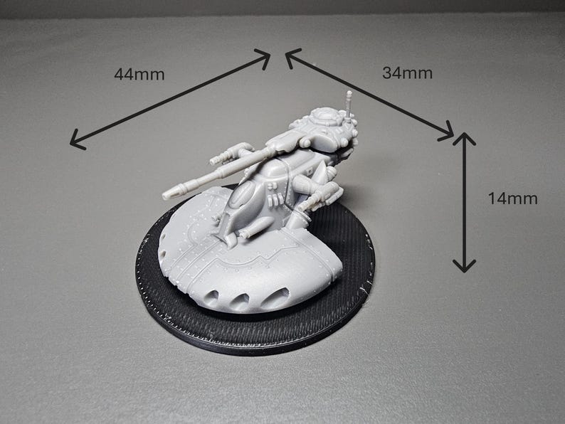May include: A detailed, unpainted miniature model of a futuristic vehicle, measuring 44mm long, 34mm wide, and 14mm high. The model is mounted on a textured black circular base. The vehicle features intricate details.