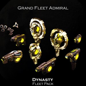 May include: A set of gold and brown spaceship models, including a large, circular ship with a yellow centre and the text "Grand Fleet Admiral" and "Dynasty Fleet Pack".