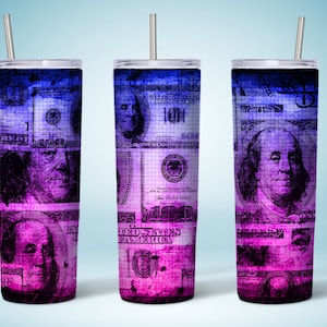 May include: Three stainless steel tumblers with a graphic of US dollar bills in shades of pink and blue. The bills are printed with a grid pattern and feature Benjamin Franklin's portrait.