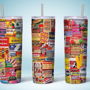 May include: Three stainless steel tumblers with colorful vintage gum and candy wrappers printed on the exterior. The tumblers have lids and straws.