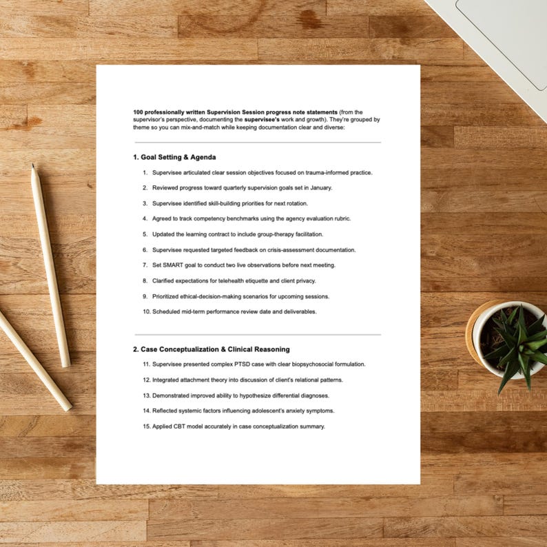 May include: A white document with text on a wooden desk. The document lists supervision session progress note statements, including goal setting, agenda, and case conceptualisation. A small potted plant and a pen are also visible.