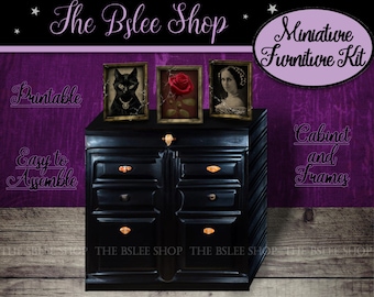 May include: Printable miniature furniture kit featuring a black cabinet with gold drawer pulls and three picture frames. The frames are decorated with a black cat, a red rose, and a woman's portrait. The text "The Bslee Shop" and "Miniature Furniture Kit" is visible in the image.