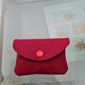 Bolso de fieltro rojo burdeos