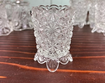Vintage pair of peg votive candle holders. Clear buttons and daisy 1970’s candleholders.  Wall sconce, tabletop, or in a candlestick.