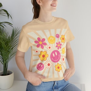 retro smiley face t-shirt with text and graphics