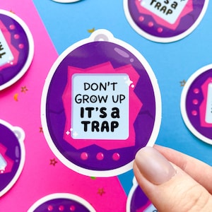 Papier glacé ne grandissez pas pour animal de compagnie virtuel | Sticker virtuel pour animal de compagnie | autocollant des années 90 | Citation Ne grandis pas | Ne jamais grandir | C'est nul