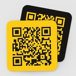 May include: Two square QR code designs. One is yellow with a black QR code, and the other is black with a yellow QR code. The corners of the squares are rounded. The QR codes are made up of black squares.