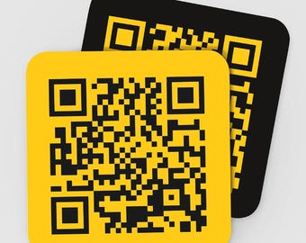 May include: Two square QR code designs. One is yellow with a black QR code, and the other is black with a yellow QR code. The corners of the squares are rounded. The QR codes are made up of black squares.