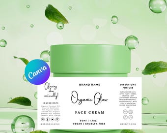 May include: A green jar of face cream with a white label that reads "Organic Glow Face Cream 50ml | 1.7oz. Vegan | Cruelty-Free". The label also includes the brand name, ingredients, directions for use, and a website address.