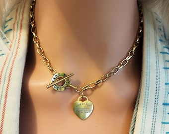 Toggle heart necklace engraved in golden stainless steel