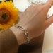 see more listings in the Bracelets  section