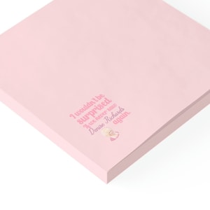 May include: Pink stack of sticky notes with the text "I wouldn't be surprised if you danced with Denise Richards again."