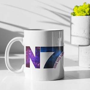 Taza de café Mass Effect Galactic N7: Diseño de letras galácticas "Come Back Alive" - Cerámica de 325 ml