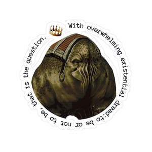 May include: A digital illustration of a green, grotesque creature with a crown above its head. The creature is surrounded by text that reads "With overwhelming existential dread: to be or not to be, that is the question."