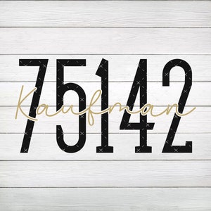 May include: Black and white number 75142 with the word "Kaufman" written in gold cursive script on a white wood background.