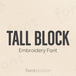 May include: The words "TALL BLOCK" in a dark gray, bold font, with "Embroidery Font" below it. The background is a light beige color. The fontstation logo is at the bottom.